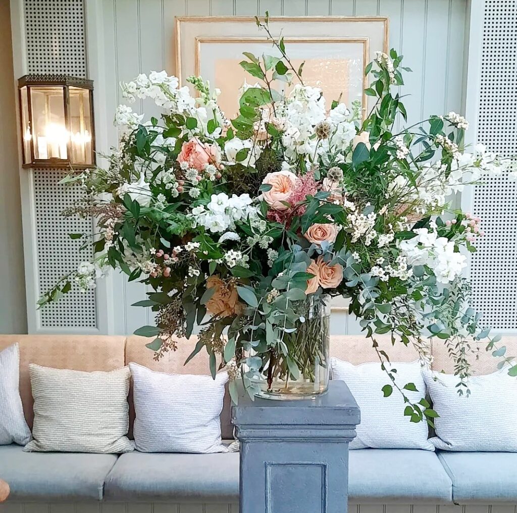 Natural wedding ceremony florals at The Hoste Arms in Burnham Market North Norfolk 