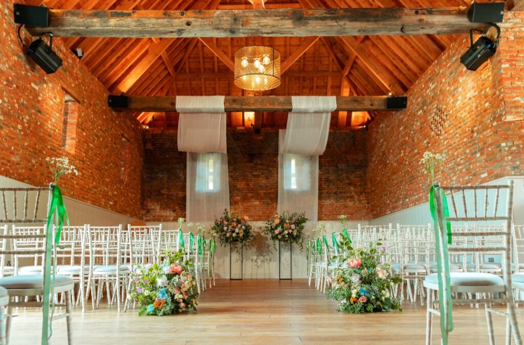 Colourful and natural ceremony flowers at The Woodyard Worstead Estate Norfolk