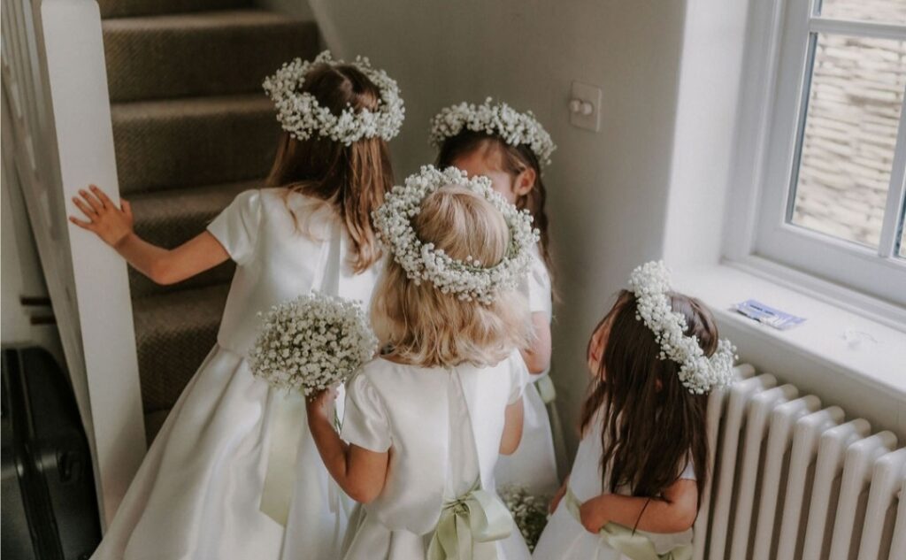 Cute flower girls gypsophila flower crowns and posies