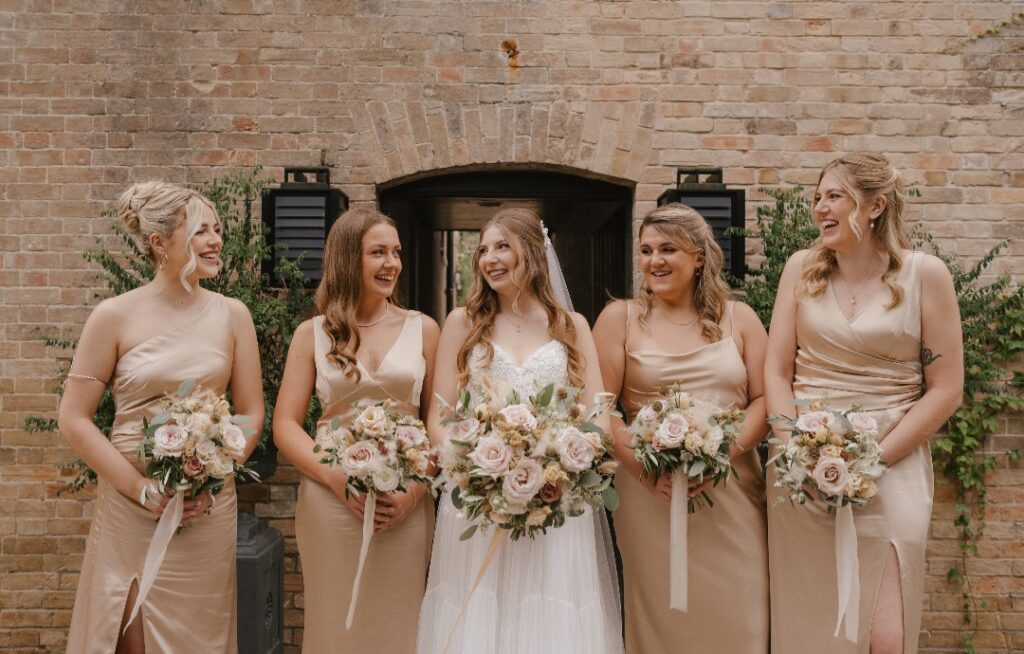 All the beige tones for Emma's bridal bouquet and bridesmaids bouquets. At Shotesham Park wedding venue Norfolk 
