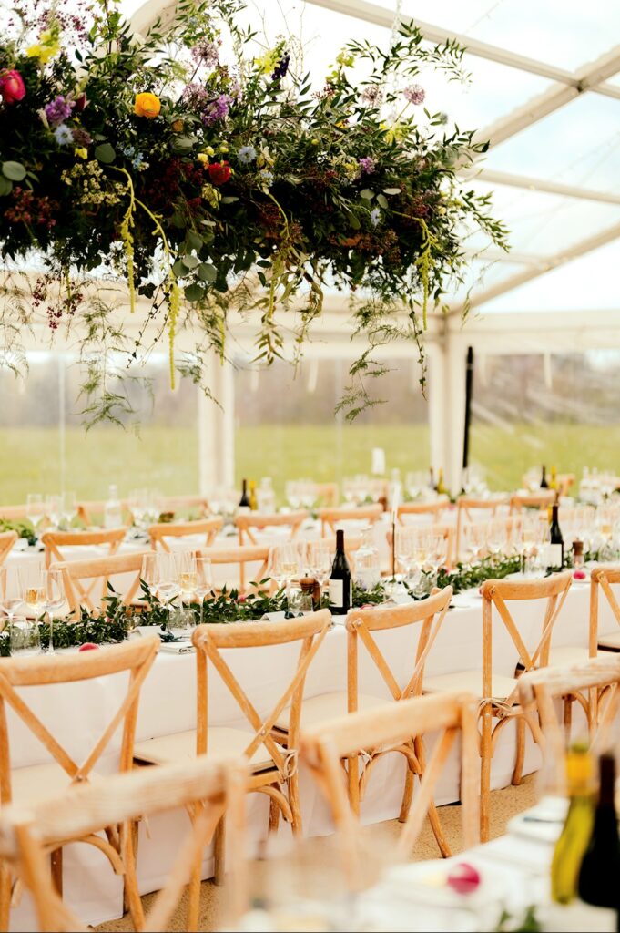 Marquee suspended garden floral design at Chaucer Barn wedding venue Norfolk